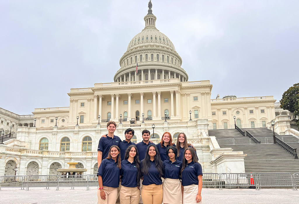 Youth Tour delegates standing in front of the U.S. Capitol Building.