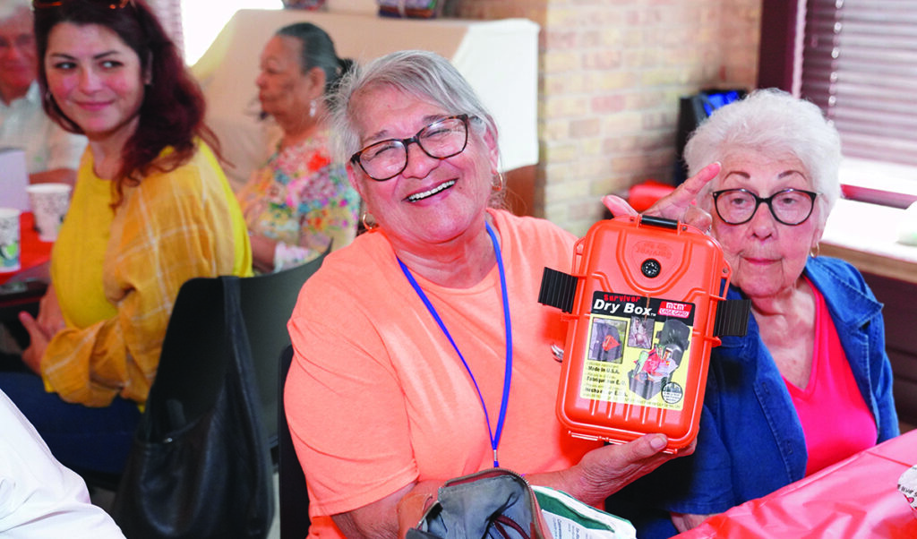 A PEC member with an emergency kit