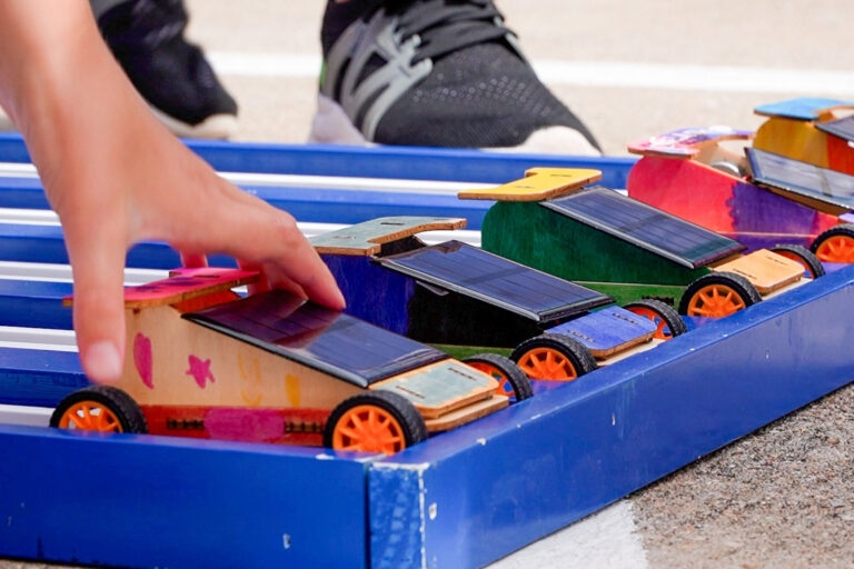 Photo of solar derby cars at starting line