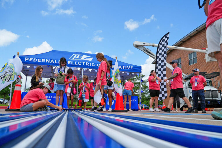 Photo of kids at solar derby track