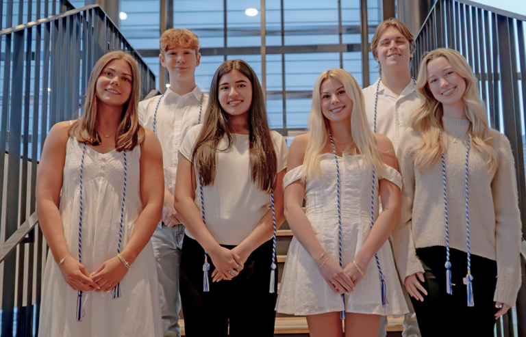 Photo of scholarship recipients standing on stairs