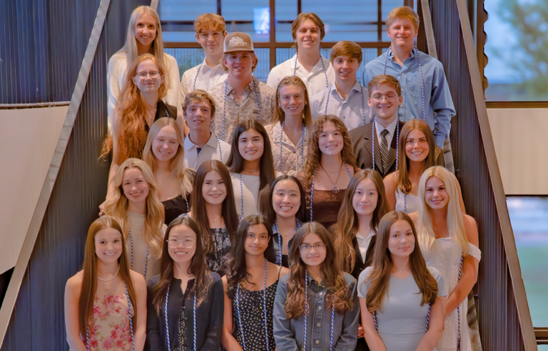 Photo of scholarship recipients standing on stairs