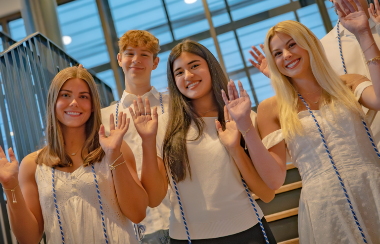 Photo of scholarship recipients standing on stairs