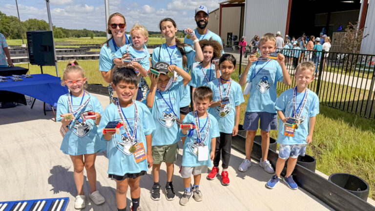 Photo of kids at PEC's Solar Car Derby.