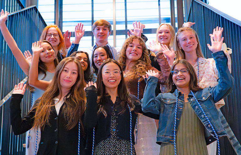 Photo of PEC scholarship recipients standing on stairs
